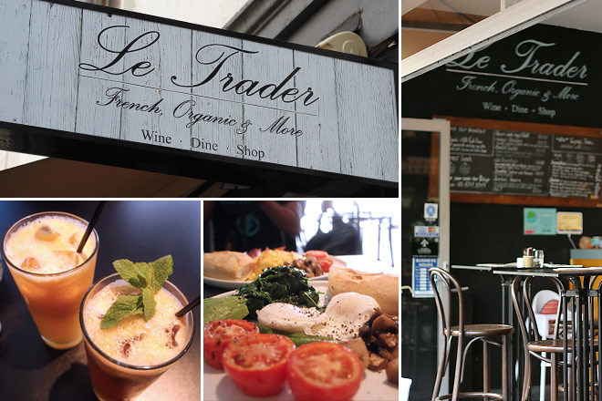 Le Trader sign, cafe stools, fresh juices, and vegetarian brekkie.